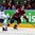 MINSK, BELARUS - MAY 10: Latvia's Mikelis Redlihs #24 skates with the puck while Finland's Ville Lajunen #47 defends during preliminary round action at the 2014 IIHF Ice Hockey World Championship. (Photo by Andre Ringuette/HHOF-IIHF Images)

